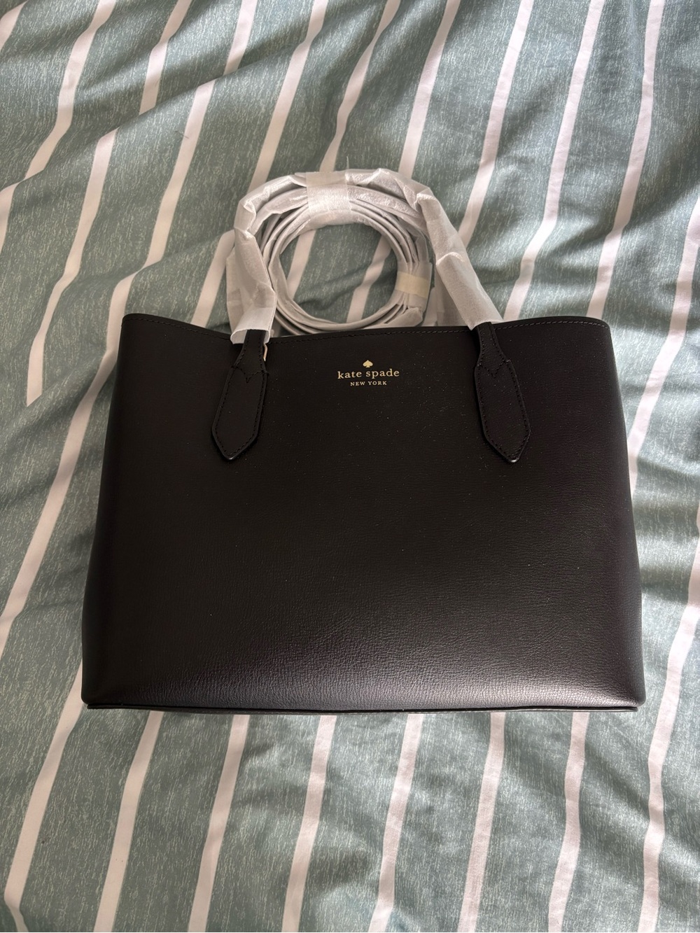kate spade black leather Harper handbag with gold logo